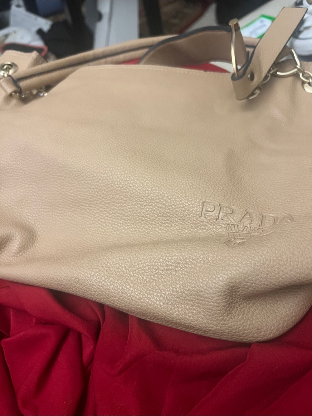 It may/may not be a vintage Faux Prada Taupe-Beige Pebbled Leather Shoulder bag.